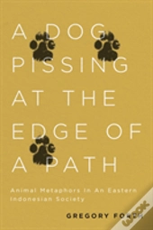 A Dog Pissing At The Edge Of A Path