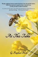 At This Table