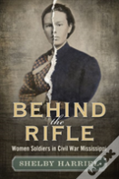 Behind The Rifle