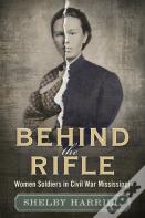 Behind The Rifle