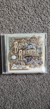 Capa do artigo Born And Raised - CD