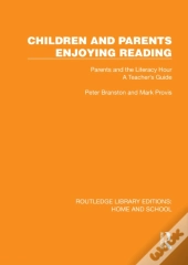 Children And Parents Enjoying Reading