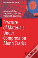 Fracture Of Materials Under Compression Along Cracks