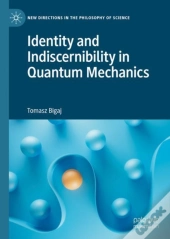 Identity And Indiscernibility In Quantum Mechanics