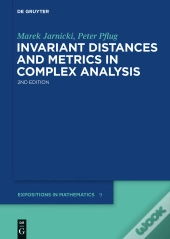 Invariant Distances And Metrics In Complex Analysis