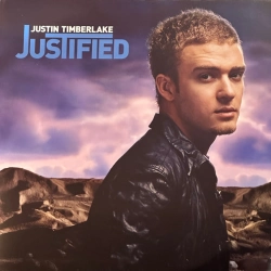 Capa do artigo Justified - Vinil