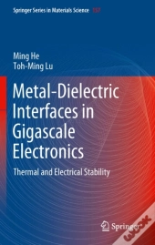Metal-Dielectric Interfaces In Gigascale Electronics