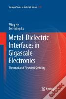 Metal-Dielectric Interfaces In Gigascale Electronics