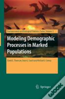 Modeling Demographic Processes In Marked Populations