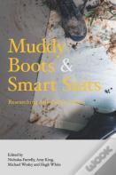 Muddy Boots And Smart Suits
