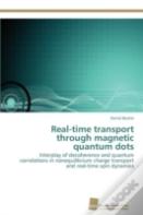 Real-Time Transport Through Magnetic Quantum Dots