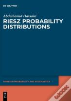 Riesz Probability Distributions