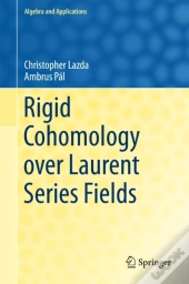 Rigid Cohomology Over Laurent Series Fields