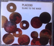 Capa do artigo Slave To The Wage - CD