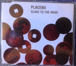 Capa do artigo Slave To The Wage - CD
