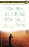 Standing In A River Waving A Stick