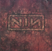 Capa do artigo The Downward Spiral - CD