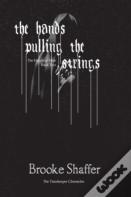 The Hands Pulling The Strings