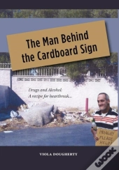 The Man Behind The Cardboard Sign