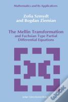 The Mellin Transformation And Fuchsian Type Partial Differential Equations