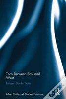 Torn Between East And West