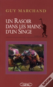 Un Rasoir Dans Les Mains D'Un Singe