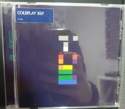 Capa do artigo X&Y - CD